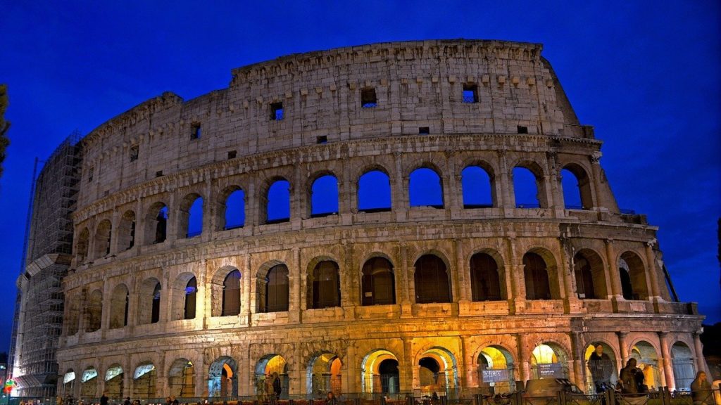 The colosseum lit up at night